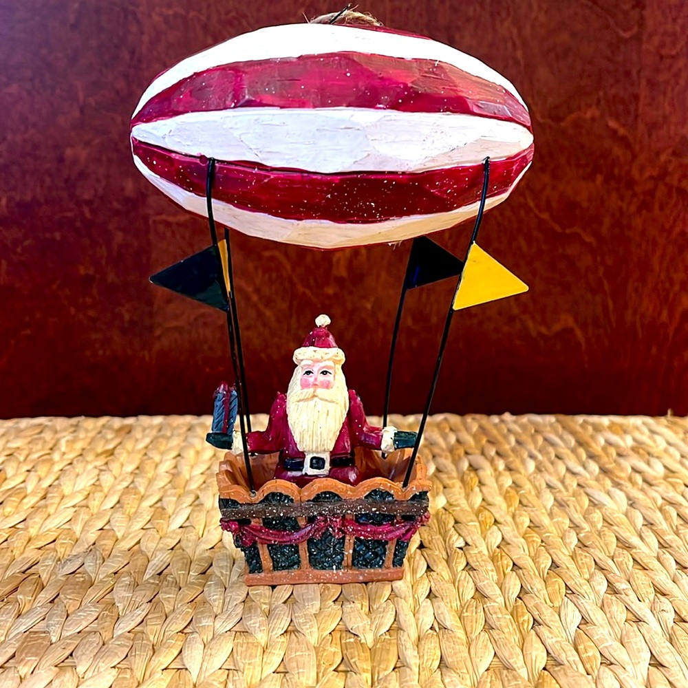 Vintage faux wood santa ornament.